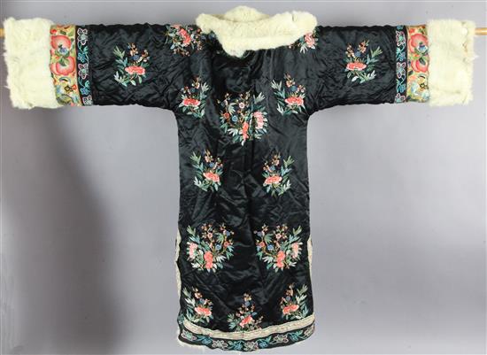 A Chinese black silk and fur winter coat, late Qing dynasty,